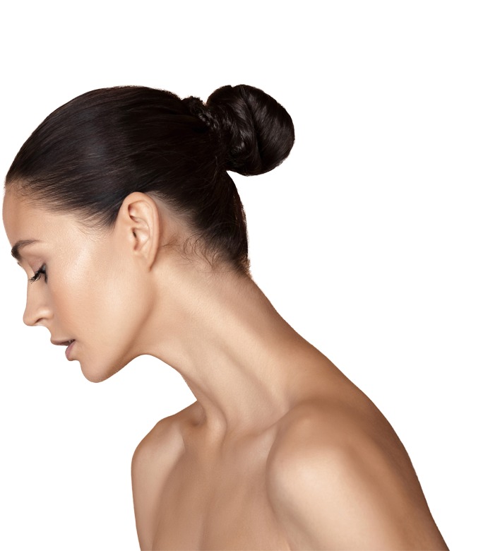 Side-profile portrait of a woman with dark hair in a bun, highlighting smooth-looking skin along the face, jawline, neck, and décolleté for RF microneedling treatment.